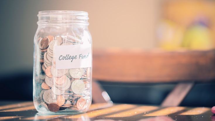 college fund jar with coins